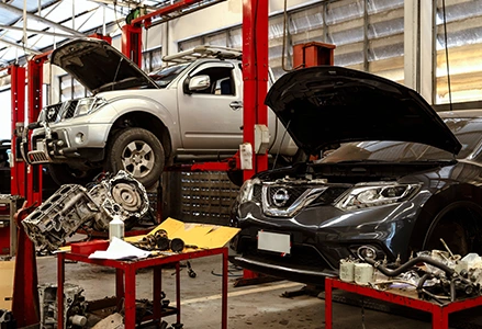 A detailed view of the tools and equipment used in an auto body repair workshop.